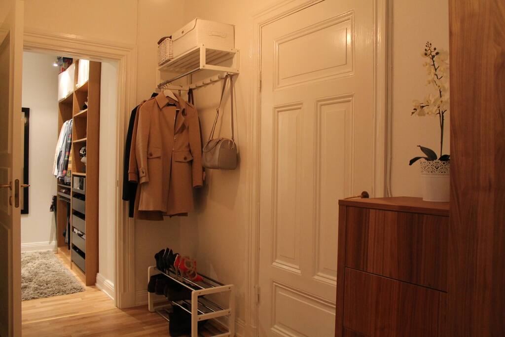Spacious hallway with double entrance doors for sound isolation