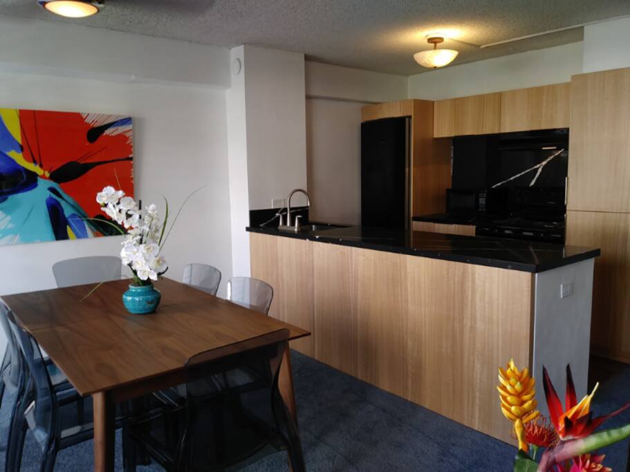 The dining area seats up to 6 people comfortably. the dining table expands to seat 8.