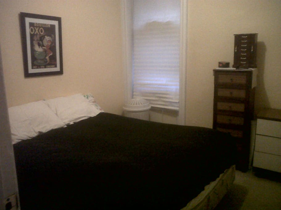 Comfy, queen bed- lots of drawers/shelves