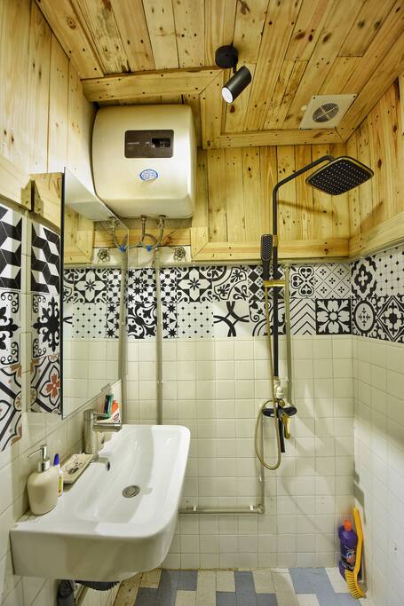 Shared bathroom with hot water