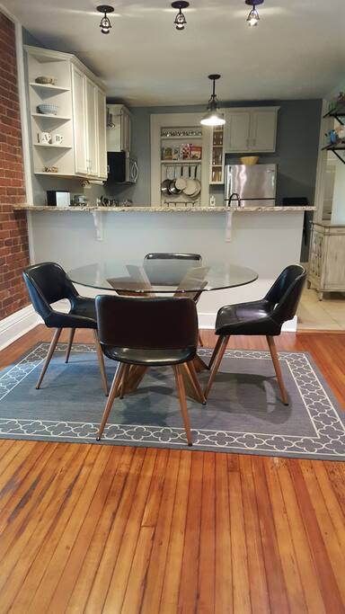 Main dining/kitchen area - table can seat 6 (extra chairs provided)