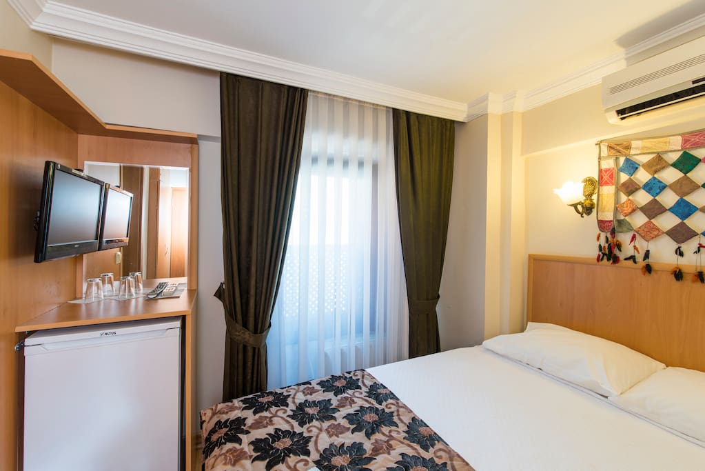 Clean, comfortable, modern room. Air-conditioned & Furnished with comfortable beds.