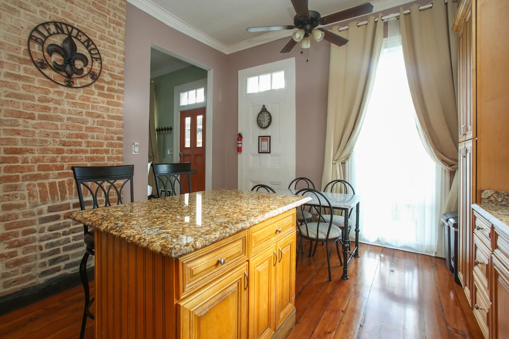 Gourmet kitchen features everything you might need to prepare and serve a meal. Seating for 6 plus another folding table and folding chairs.