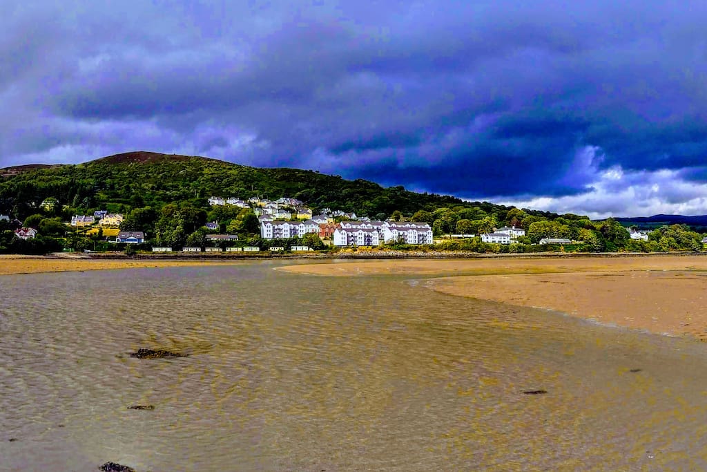 The apartment as seen from Lough Swilly at low tide. The village of Fahan includes many pleasant coastal and mountain walking trails.