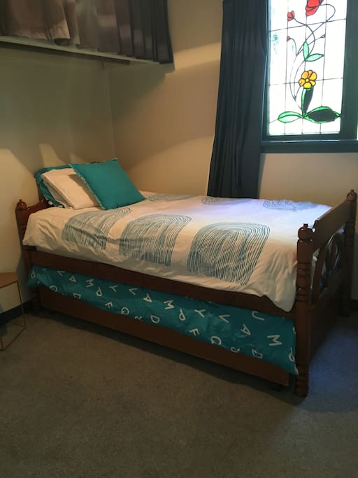 Second bedroom in Cottage. Single bed with trundler bed