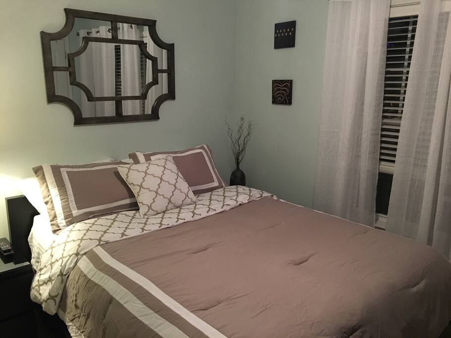 Queen bed in spare bedroom