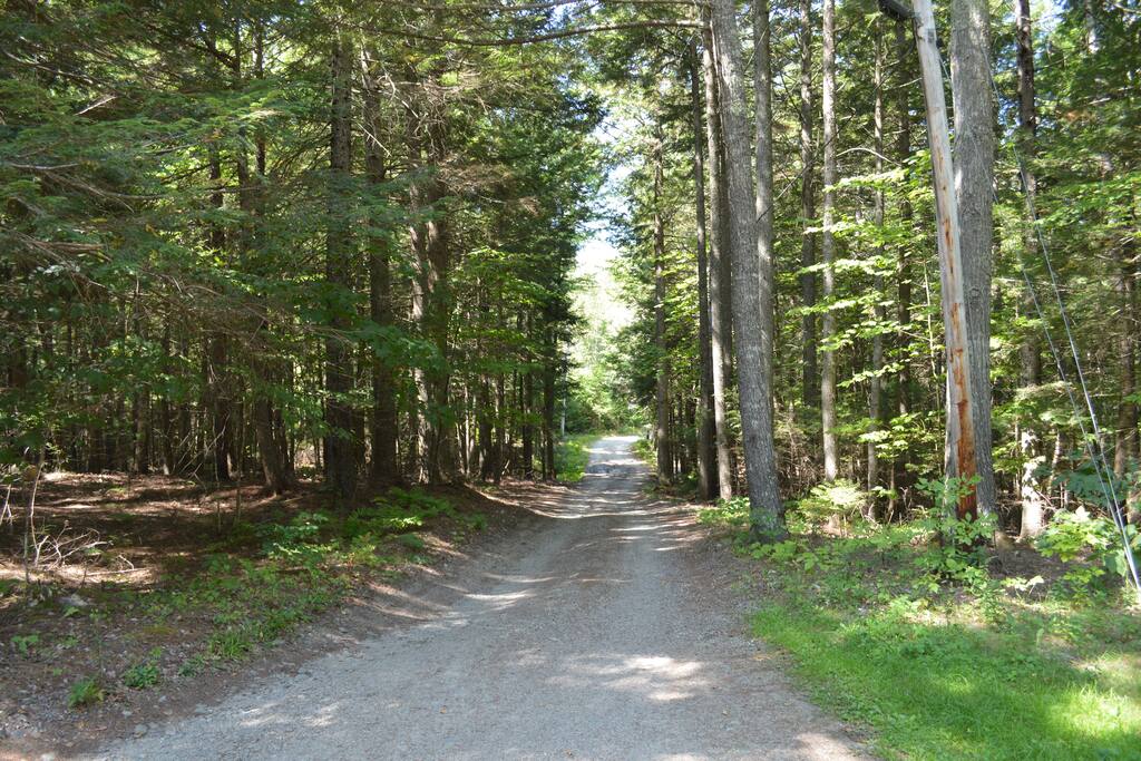 There is dirt road leading to our home. Outside of the summer months, a 4X4 wheel drive is recommended as it may be hard for lower vehicles to pass
