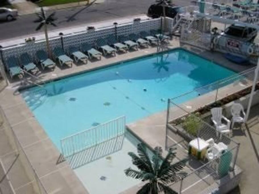 Pool with plenty of lounge chairs.