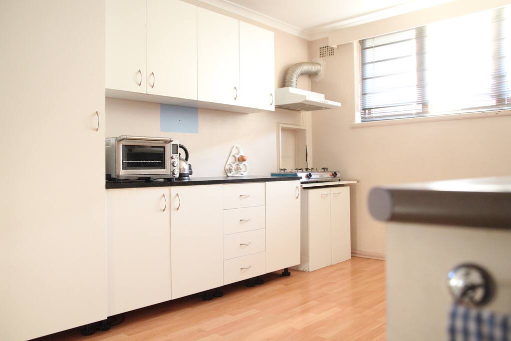 Shared kitchen.
Gas hob, convection oven/toaster/grill, microwave oven, fridge freezer and cutlery.