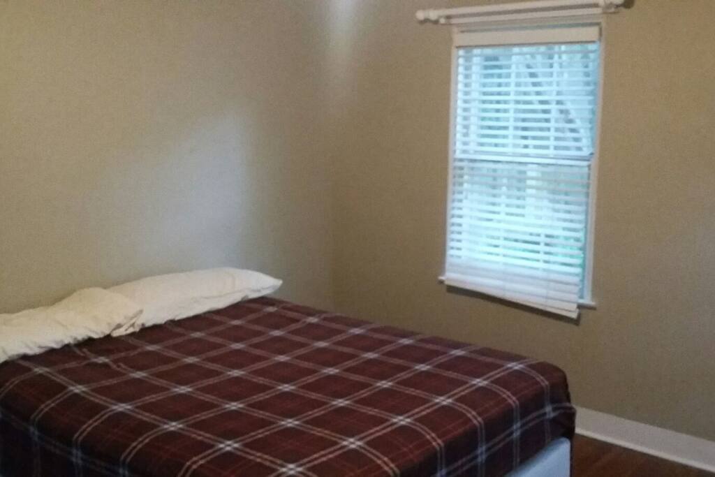 Spacious and comfortable queen sized bed.