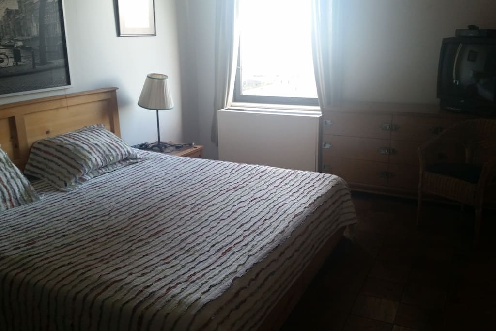 King size bed,large bureau for storage,big window,TV