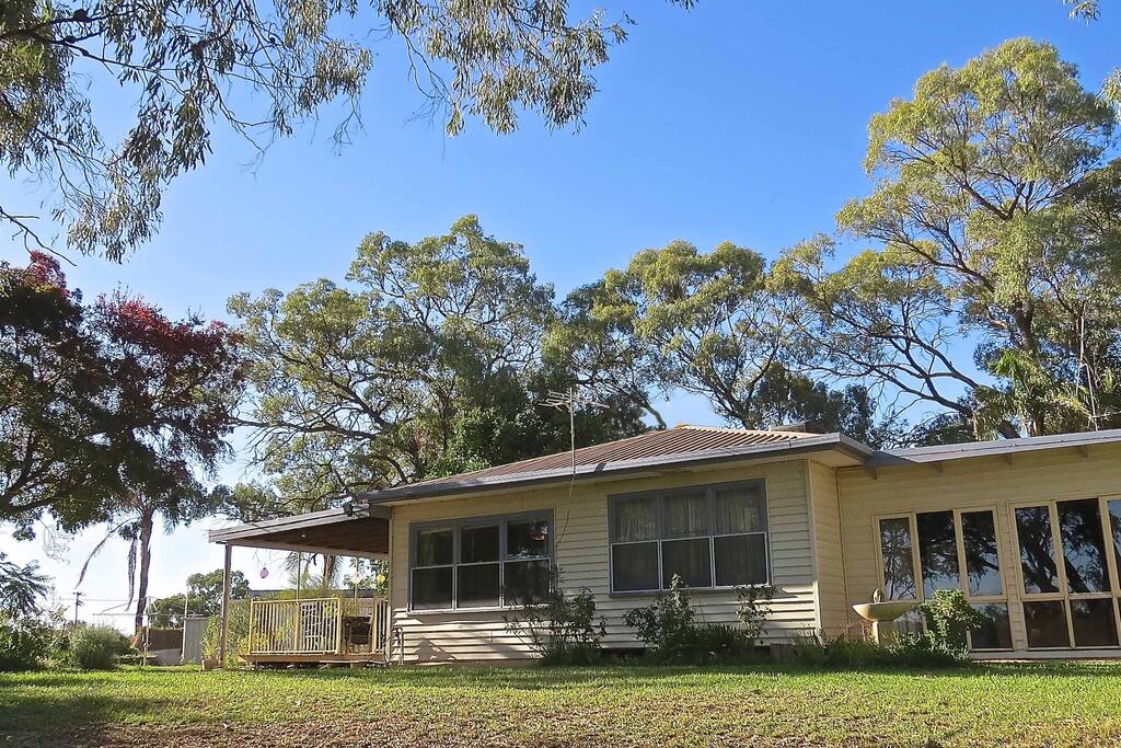 The house sits on 1.5 hectares with wide river frontage