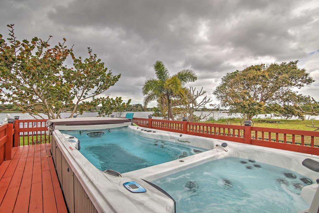 The lakefront property offers a heated swim spa and hot tub, shared with the other unit on the property.
