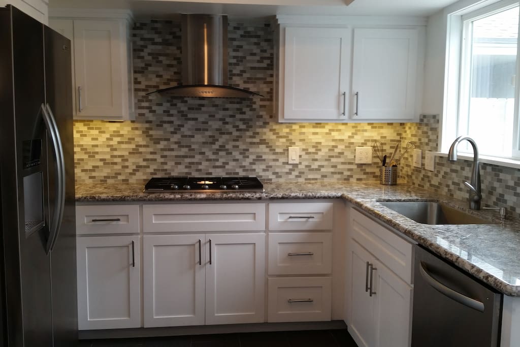 glass mosaic backsplash, spacious,wide and open