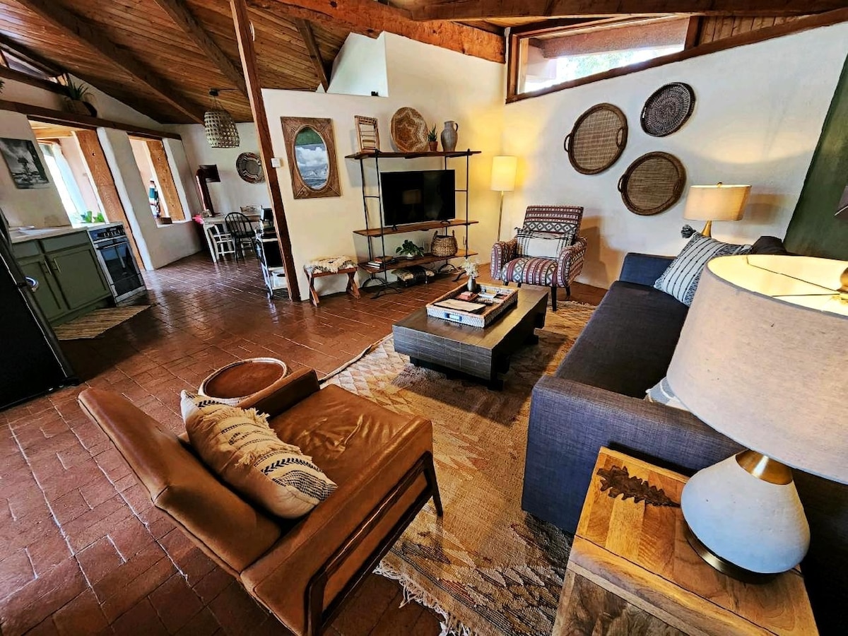 Comfortable living area that includes a smart tv to enjoy watching your streaming services. 