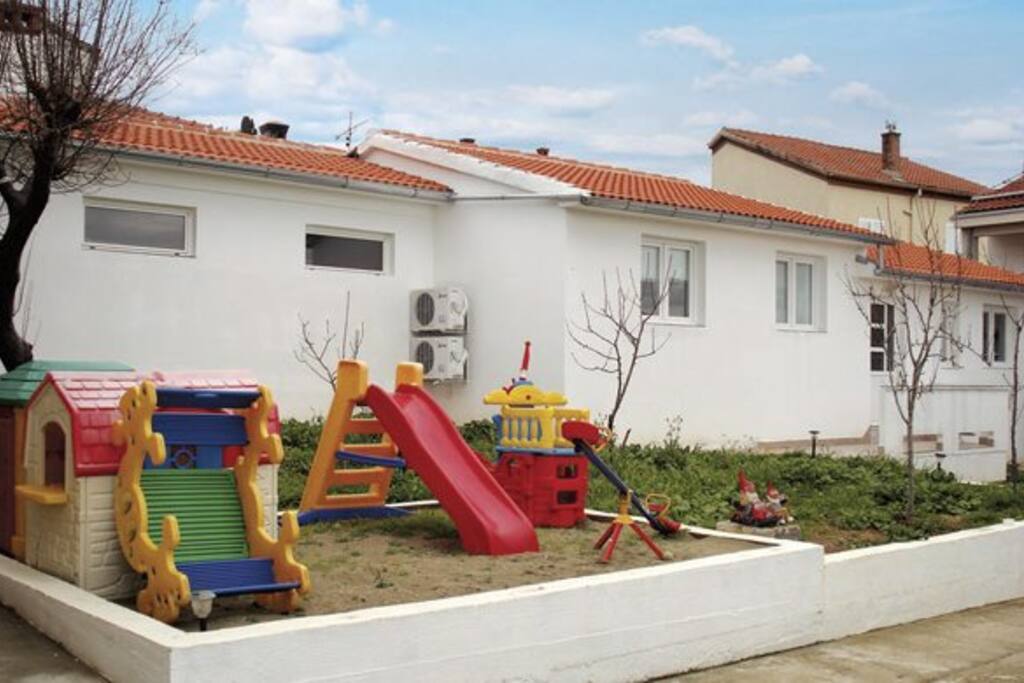 Sandy box for young childrens with toys