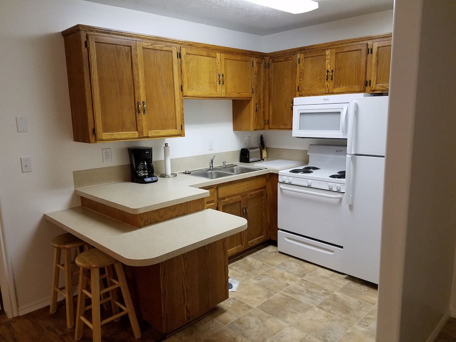 Full size frig, stove and Microwave. Fully stocked Kitchen with pots and pans and everything you need to cook your own meals.