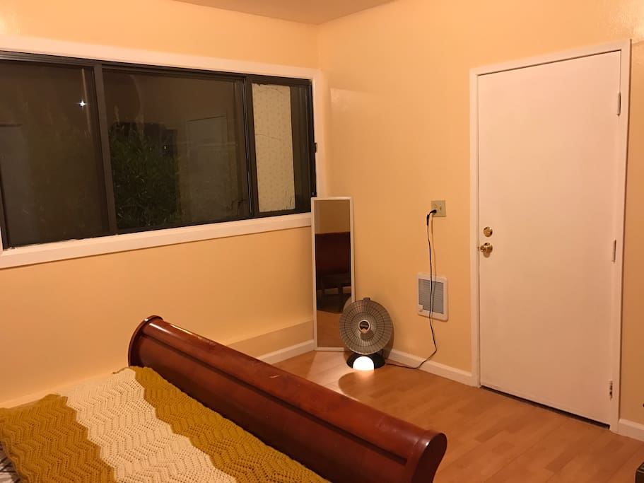 Heater and mirror included. The door you see will be the private entrance to the room.