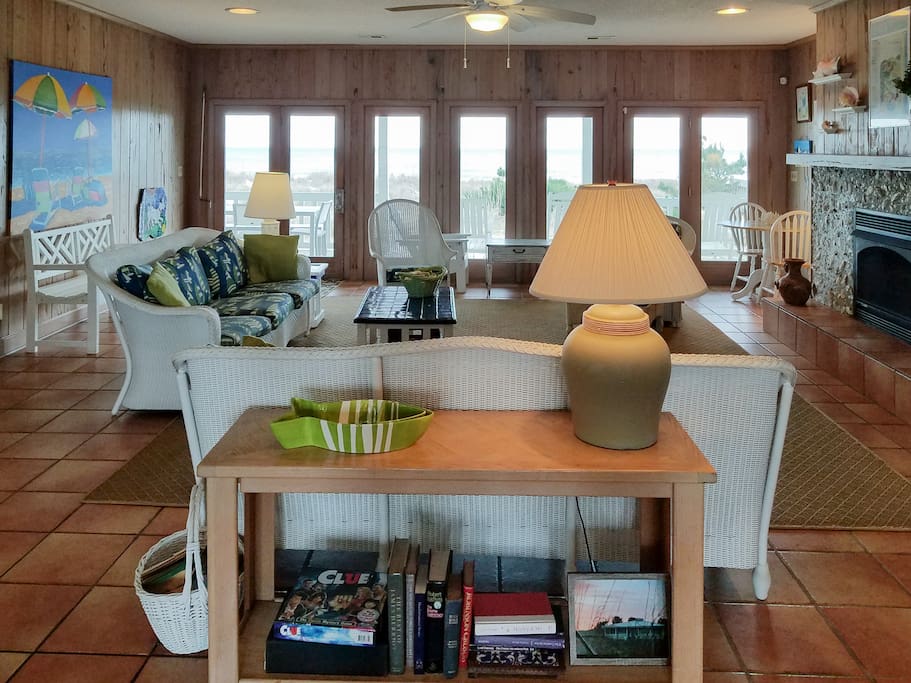 Sunlit living area with seating for the whole group.