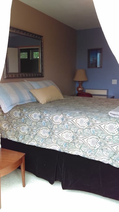 Looking in at your bedroom from the deck, through the open French doors.