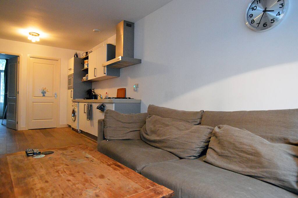 This is the spacious living room with open kitchen