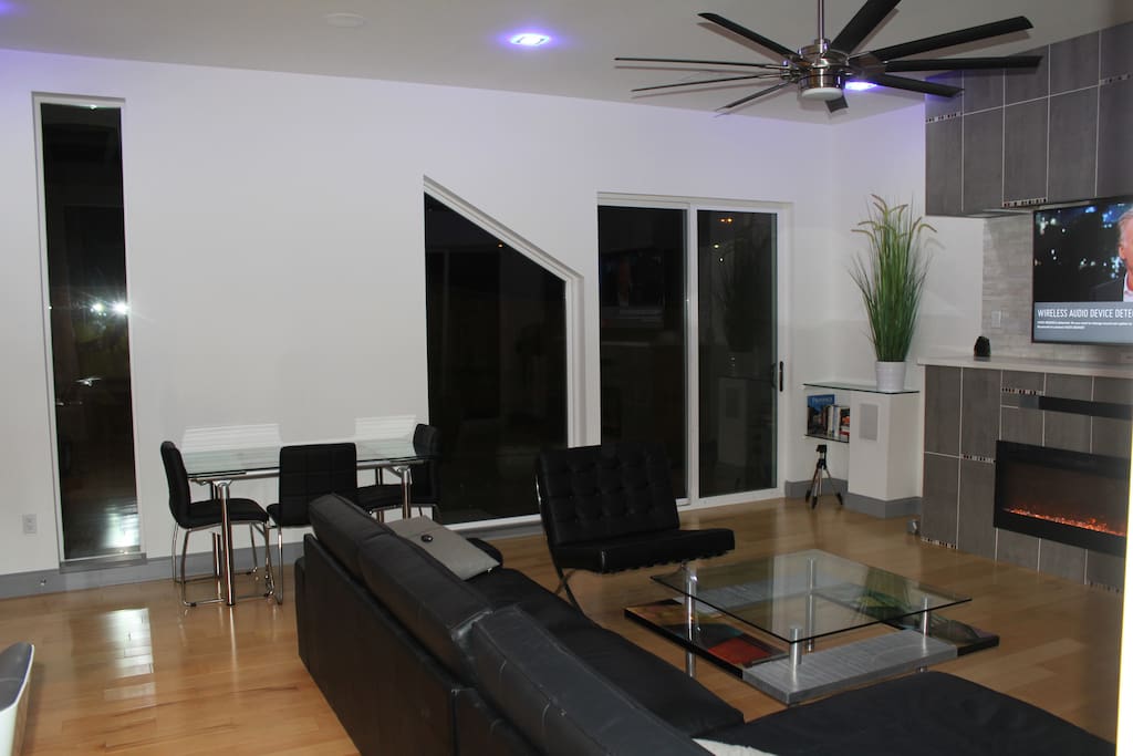 Large leather sectional and extendable dining table & chairs.