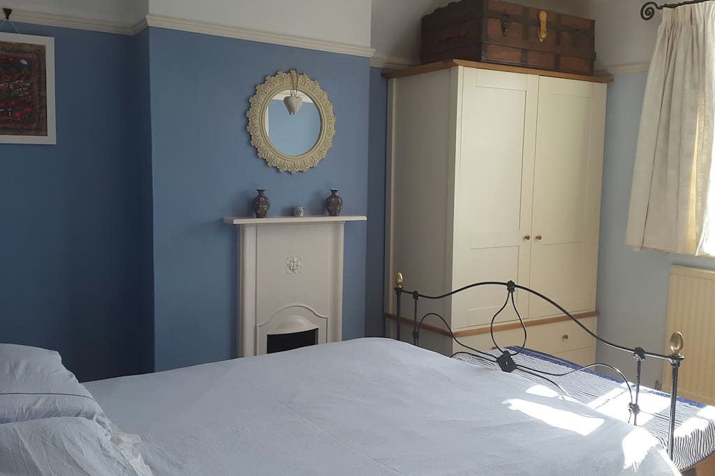 Antique cast iron bed, original fireplace and wardrobe (with plenty of storage space for guests)
