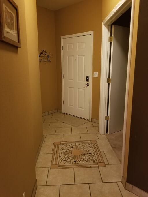 Custom tile work in entry & kithen.