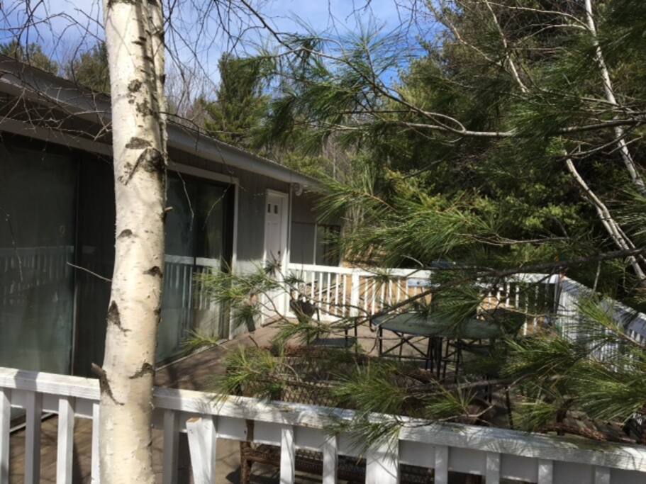 Deck with seating and grill.