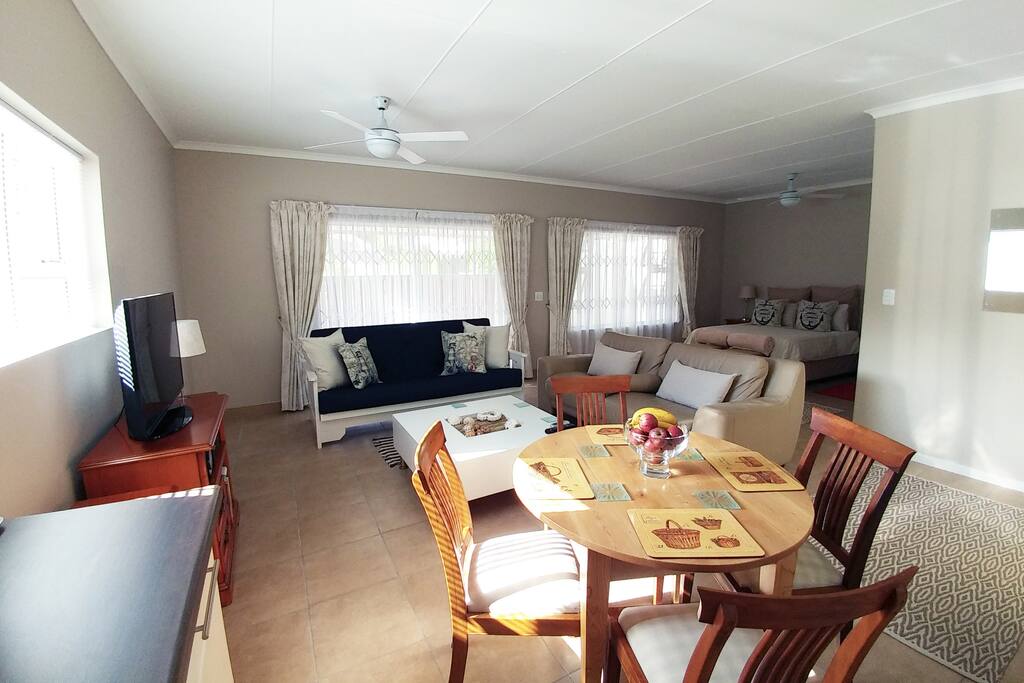 Large table provides ample working and dining space.