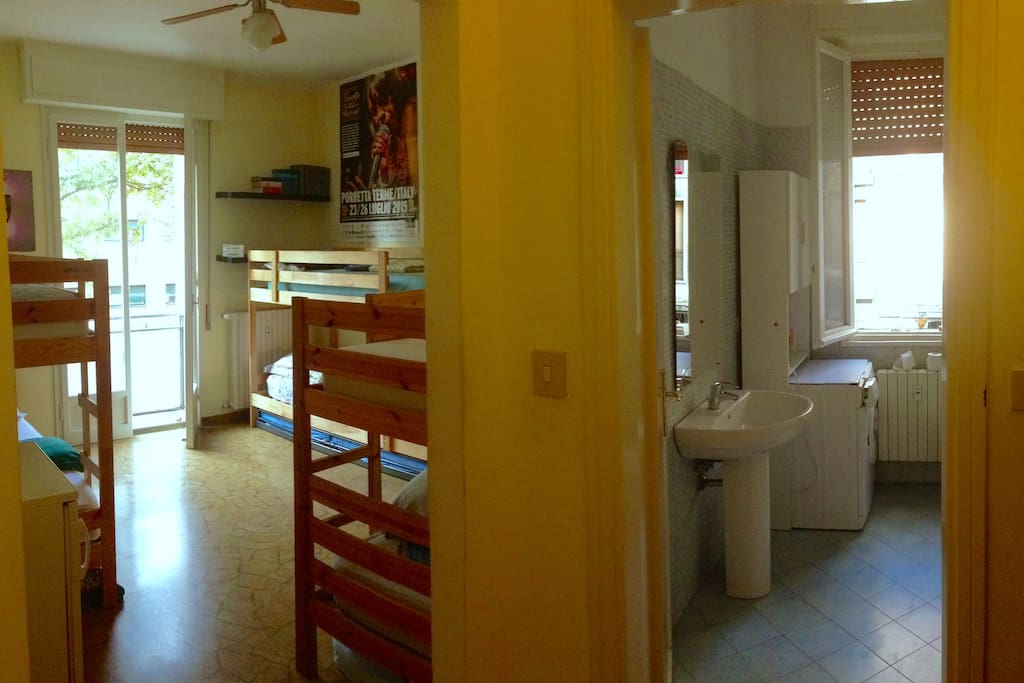 Panoramic view of bedroom and bathroom