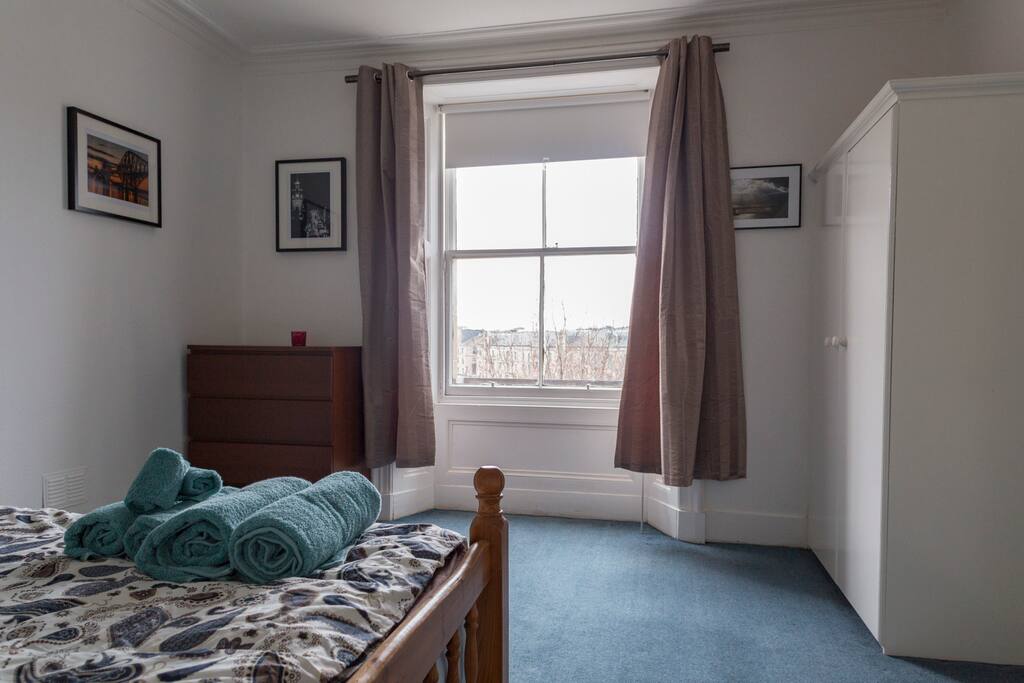 Large double bedroom with double bed and private toilet.
