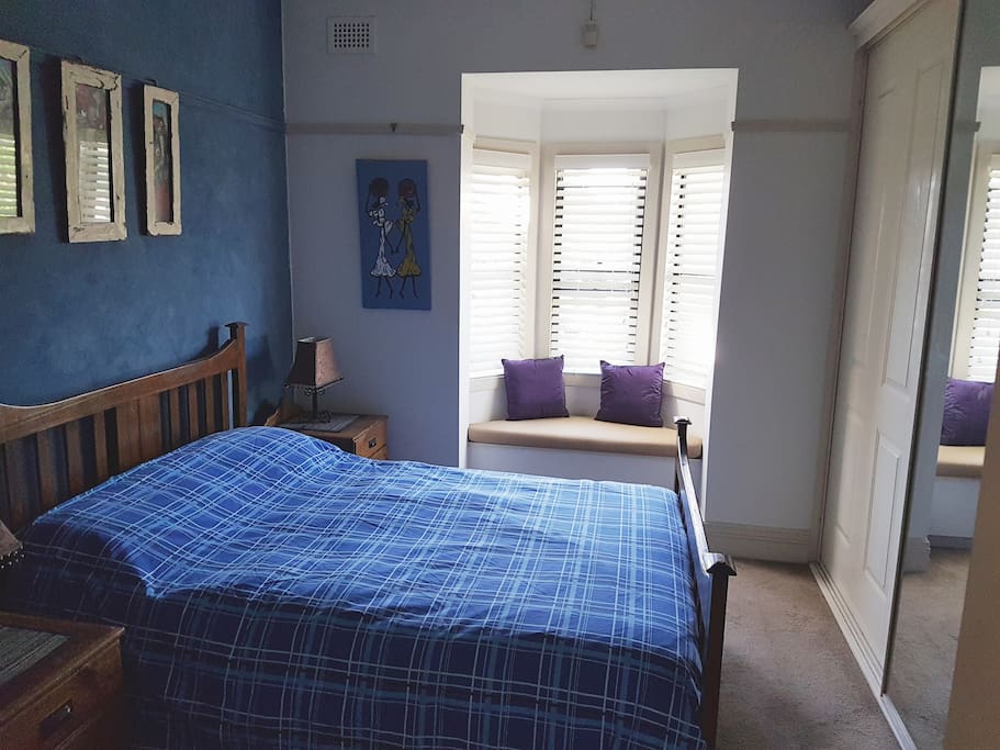 Bedroom with sunny bay window