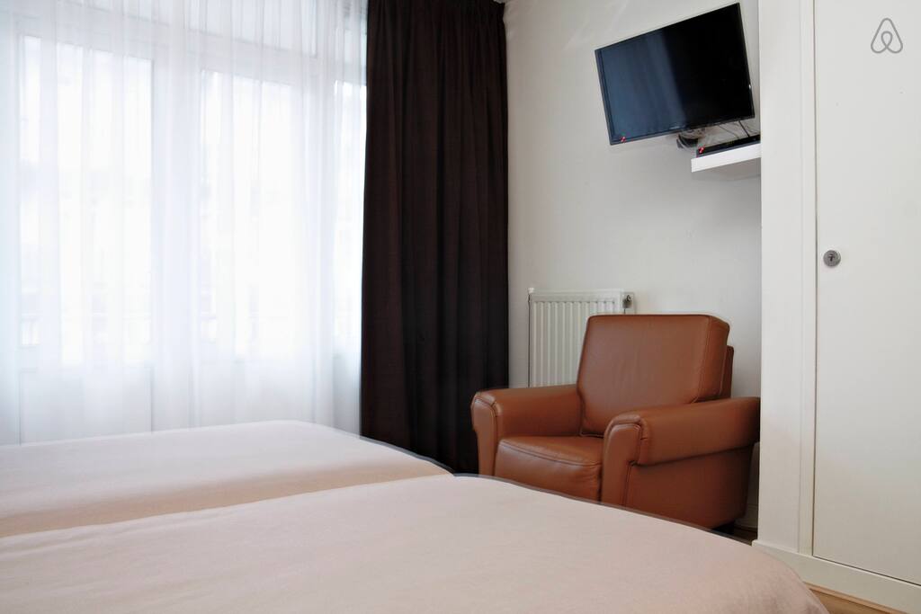 You can watch tv from your bed :)