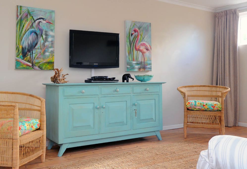 The decor is a vibrant mix of cool shades and vibrant colors