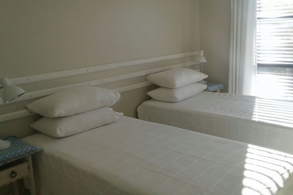 Main bedroom with two single beds which can be used as a king size bed