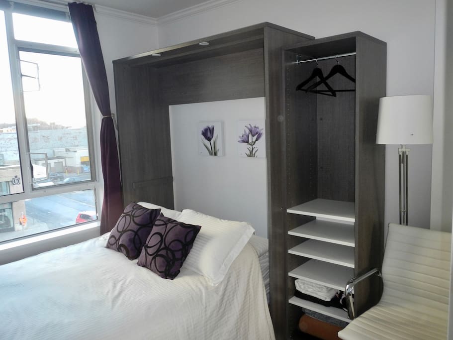 Comfy queen-sized bed + stand-alone closet