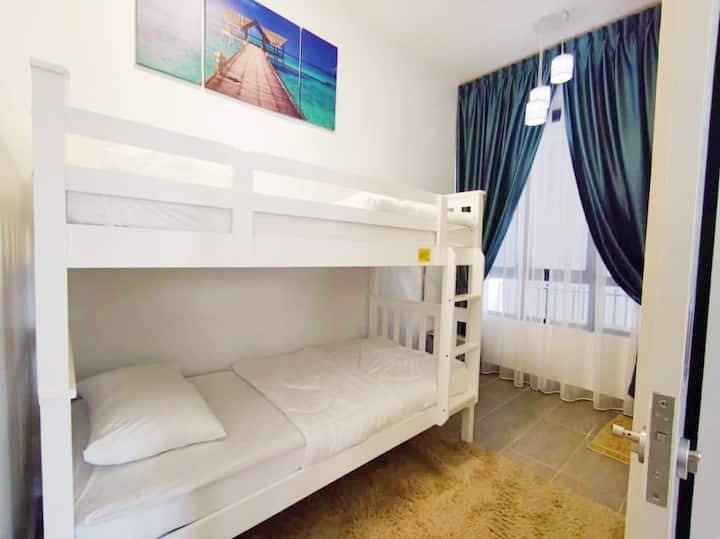 Bunkbed in the second bedroom , suits both adult and children. All rooms are equipped with fan and aircond.