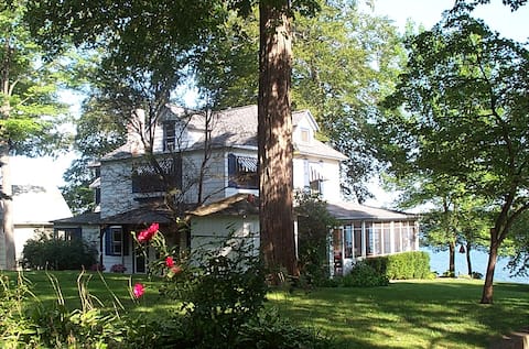 155 ft of Beachfront home on Paw Paw Lake
