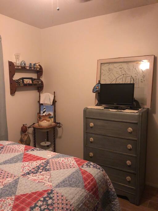 The side of the room that you would see from the bed