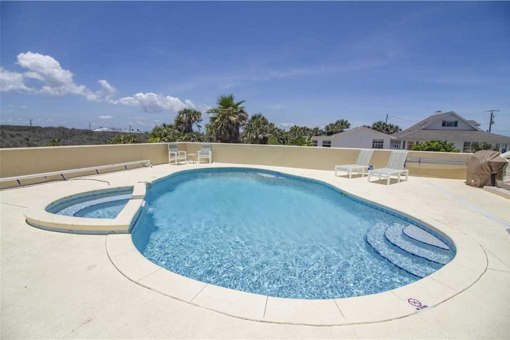 Spend an afternoon with the whole gang in the pool! - It's irresistible -- sparkling clear water, a spotless sun shelf, and the b