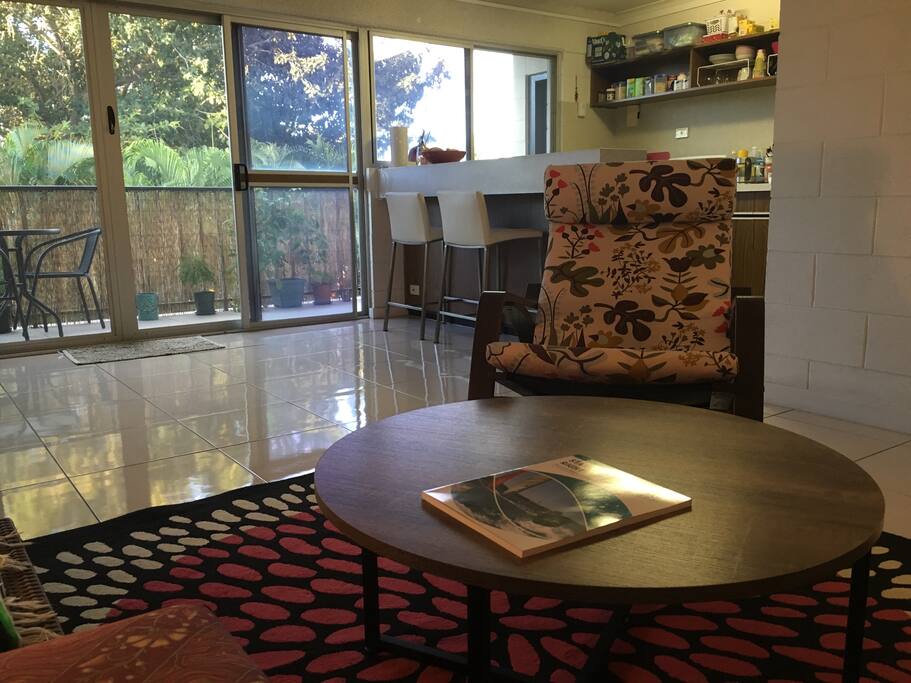 Living room has lots of natural light and breezes.