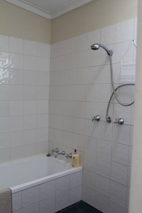 En suite bathroom and separate toilet.