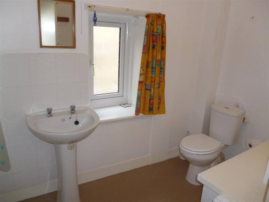 Bathroom with bath and shower