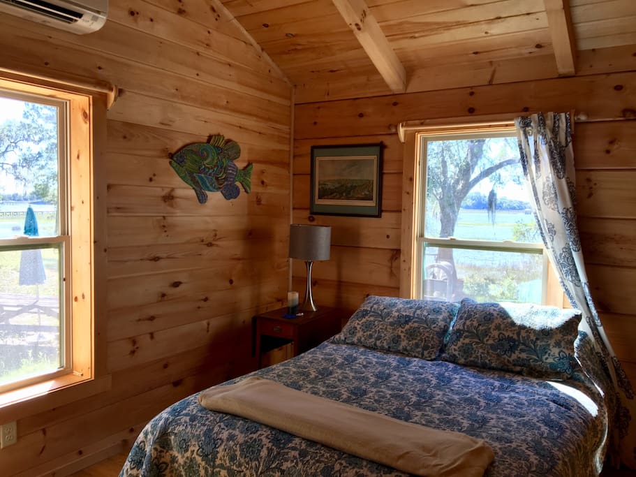 Queen size platform bed overlooking the Stono river. Locking pocket door provides privacy. It's close the bathroom.