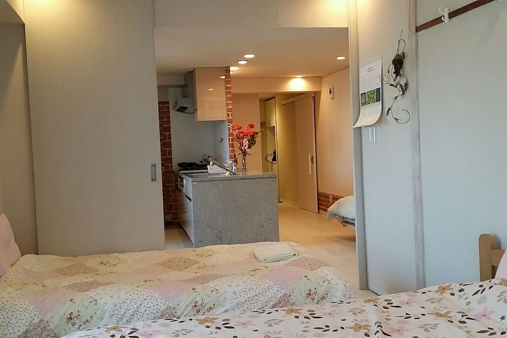 There are 3 single beds in the bedroom