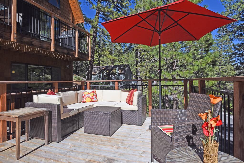 Lower front deck with comfortable couch and chairs