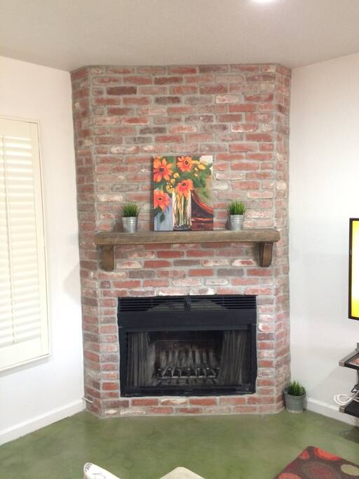 Beautiful fireplace and artwork