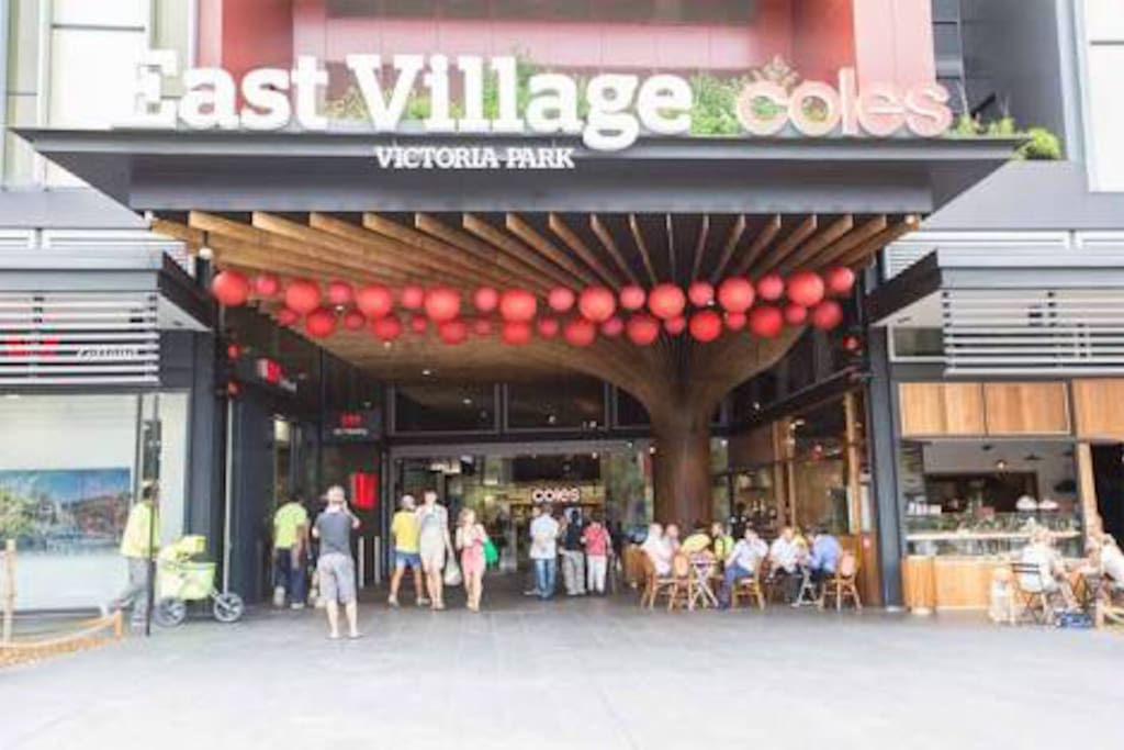 Near East Village shopping centre with supermarket and cafes