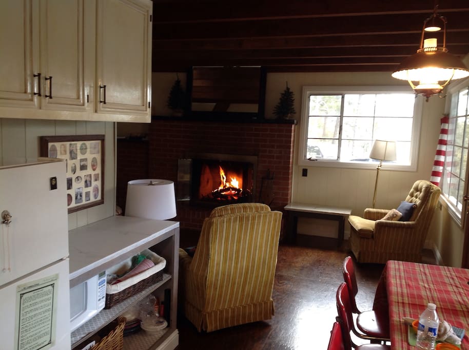 Dining area with refrigerator, and extra counter space.